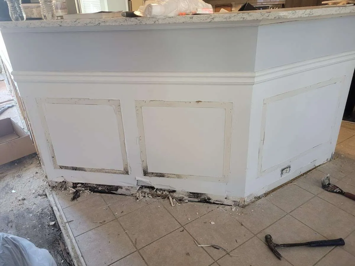 Water damage and mold on kitchen during Storm Damage Restoration in Del Aire